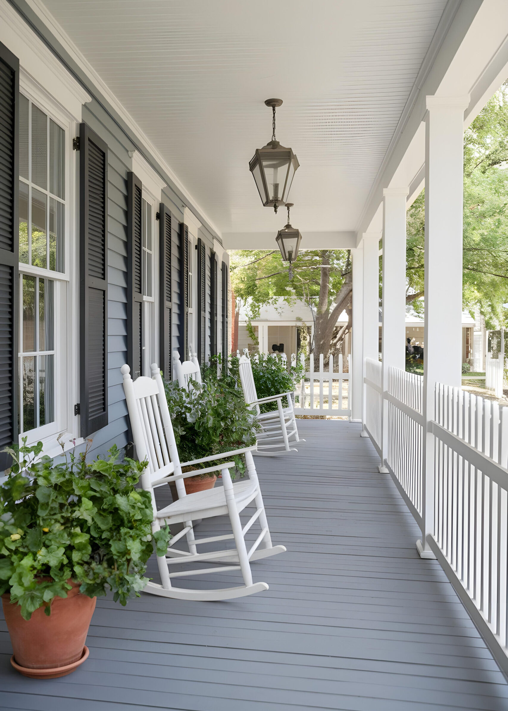 charming-front-porch-with-rocking-chairs-plants